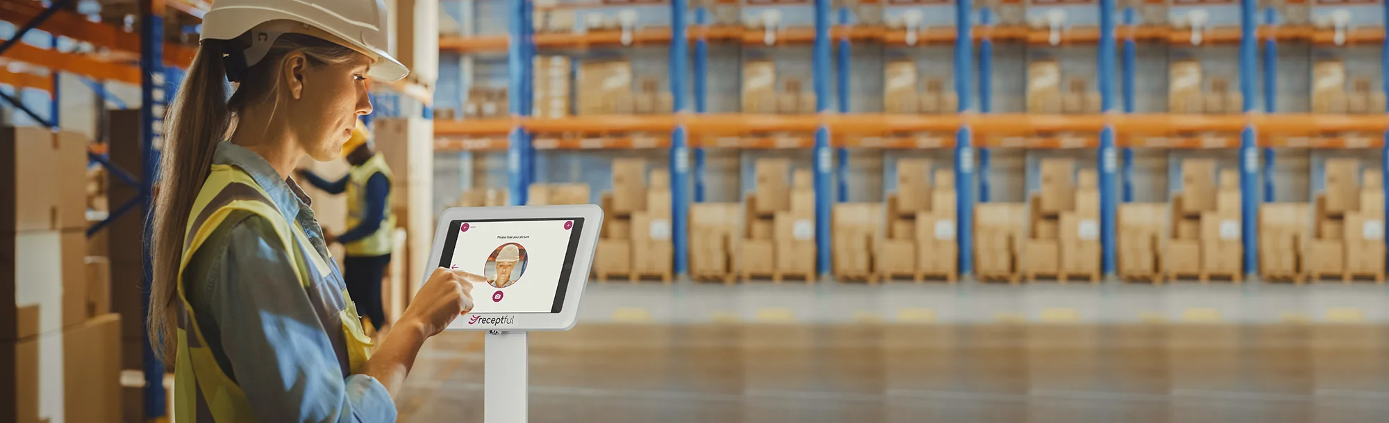 Woman checks in to a warehouse floor using Receptful